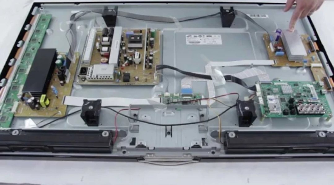 LED TV panel repair with open display and circuit boards