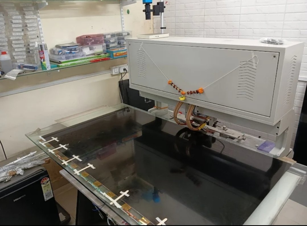 TV display panel strip repair in progress on bonding machine